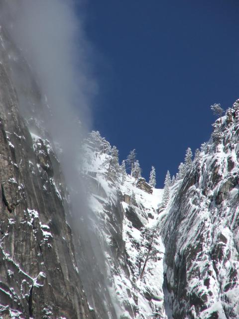 Yosemite winter-05 - Looking through Yosemite Falls at a snowy ridge