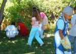 Gathering the goodies from the Piñata.