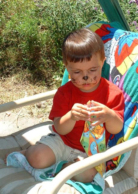 Noah examining his goodies.