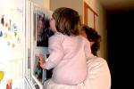 Amaia kissing "Kathryn" - Every morning, Amaia had to kiss the photo of Mama on the fridge.