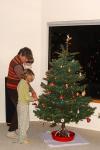 Carla and Grandma picked out the tree. John and Carla put up the lights. All of us trimmed the tree - a great evening!