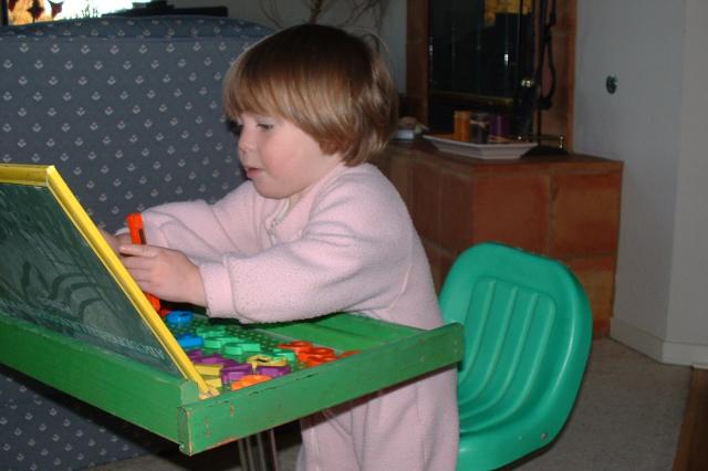 Playing with the magnetic numbers and letters.