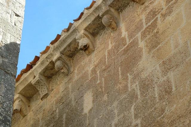 Burgos0903-35
Sepúlveda Romanesque El Salvador church and pre-gargoyle-like elements under roof