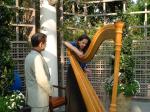 Taos and Janet-39 John (Taos' uncle who plays bassoon) and harpist who's tuning up