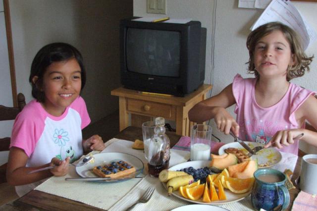 Carla and Maya 2006-15 - Maya liked to put a blueberry in each square in the waffle.